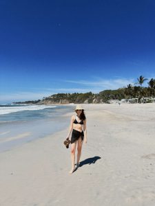 Girl standing on the beach at the W punta de mita Resort in Mexico