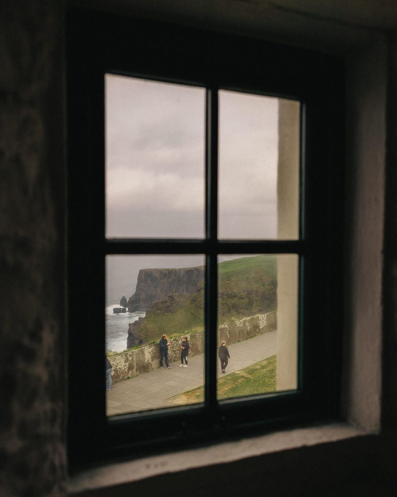 A window looking out of O'brien's Tower at The Cliffs of Moher in Ireland