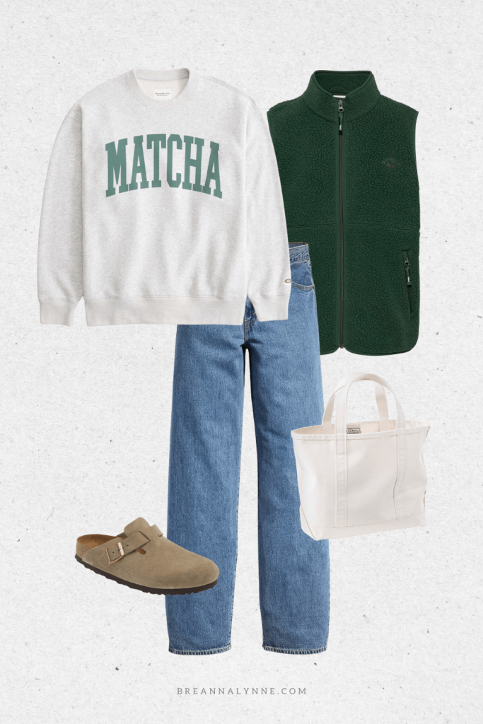 A comfy and casual fall and winter outfit. A crewneck sweater, fleece vest, levis jeans, and birkenstocks.
